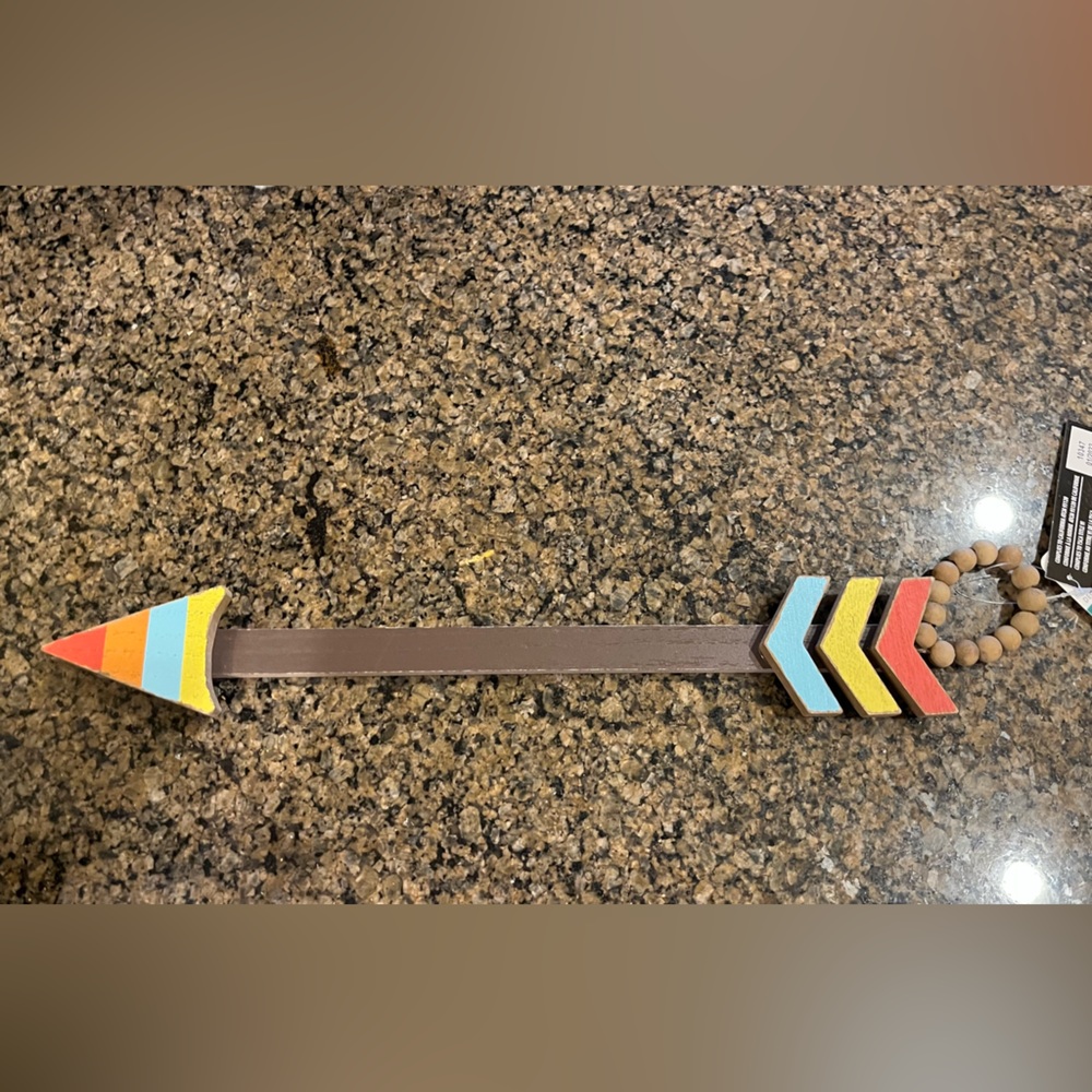Arrow wall or shelf decor.  Camping or outdoor theme.